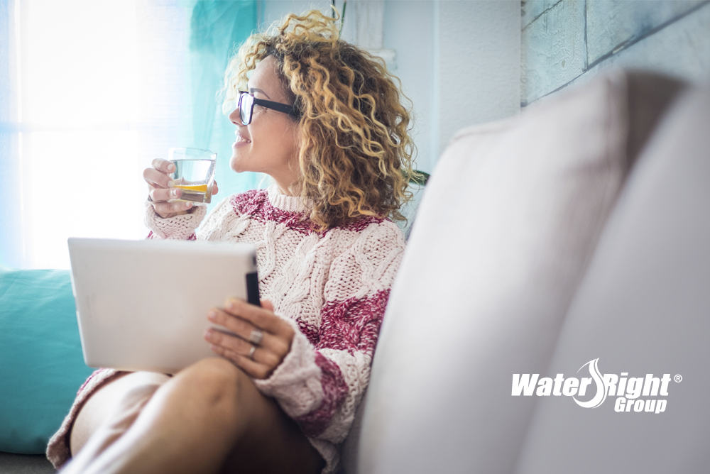 reasons for water softener woman drinking water